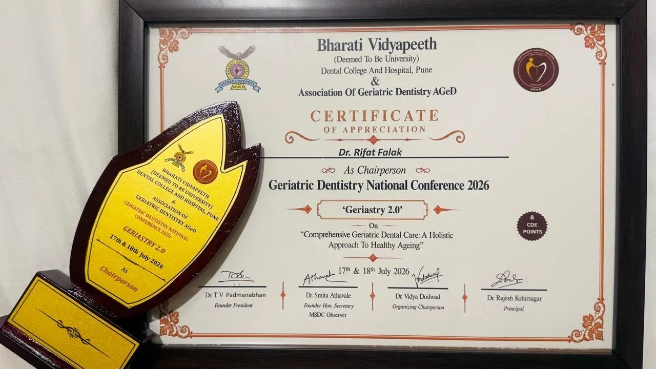 Certificate of appreciation and trophy naming Dr. Rifat Falak Chairperson of Geriastry 2.0, Geriatric Dentistry National Conference 2026